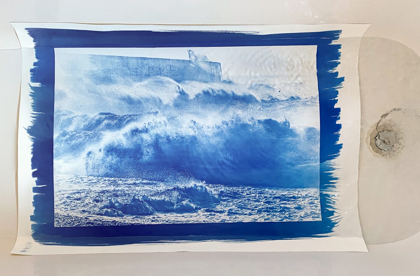 washing hand-printed cyanotype in bathtub