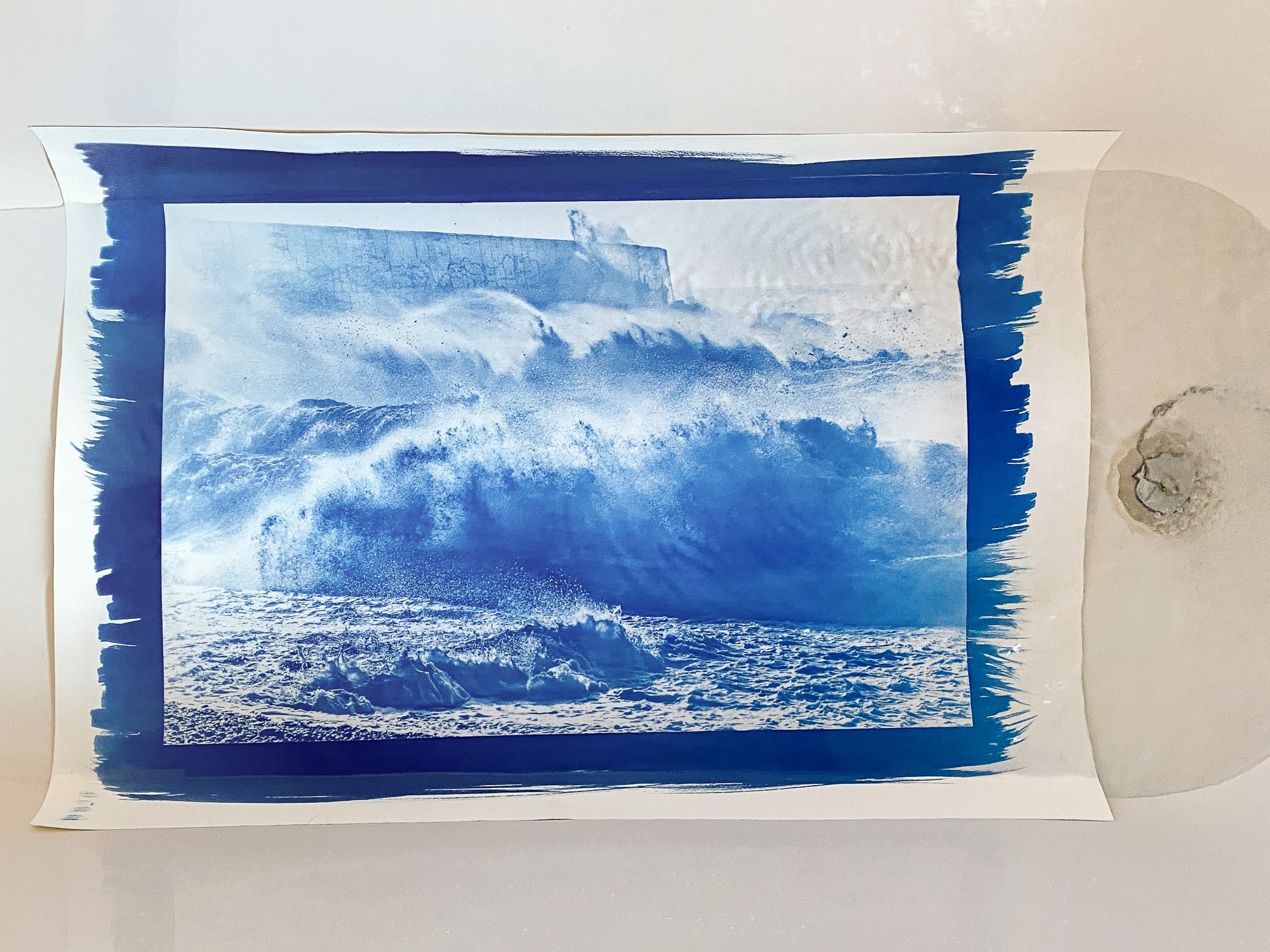 washing hand-printed cyanotype in bathtub